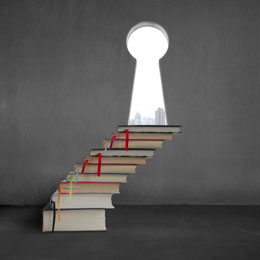 Stack of books with key shape door and city view